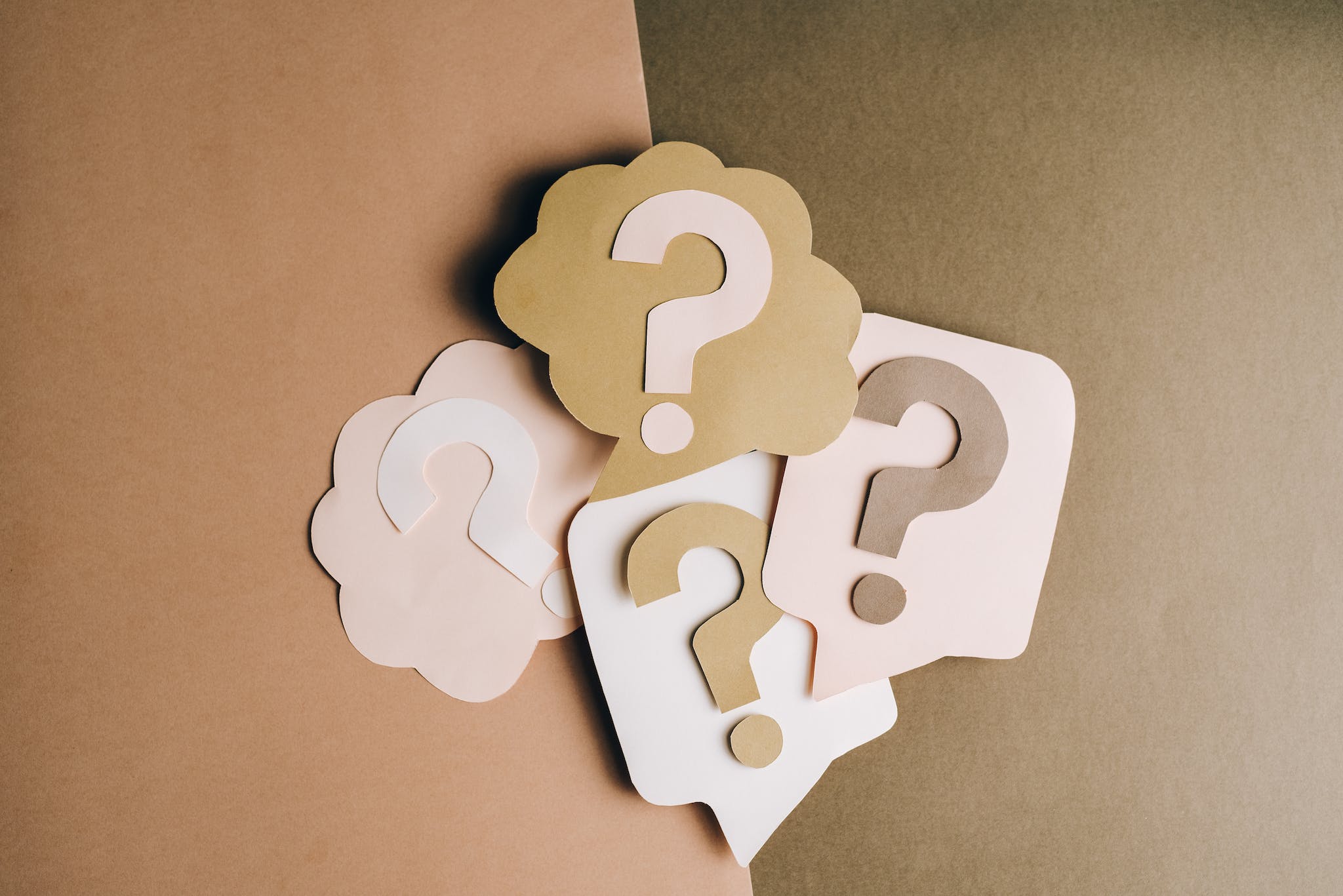 Juicy CRM FAQ Question Marks on Paper Crafts